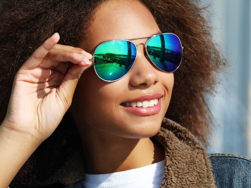a woman wearing sunglasses with a reflection of a reflection of a reflection of a reflection of a reflection of a reflection of a reflection of a reflection of a reflection of a reflection of a reflection of a