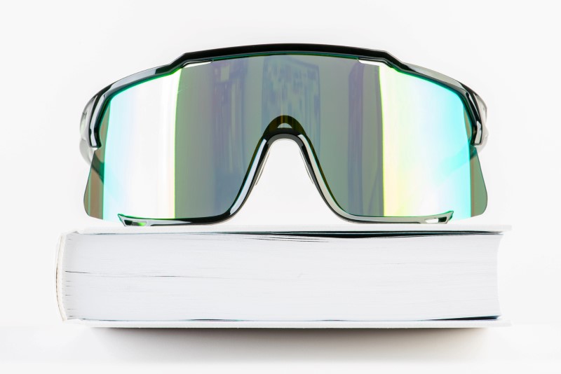 a pair of sunglasses on a book